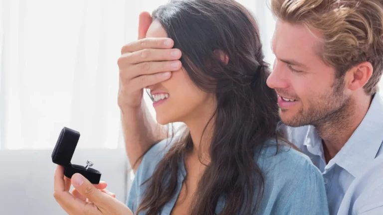 Man proposing to his girlfriend with a ring, romantic surprise moment