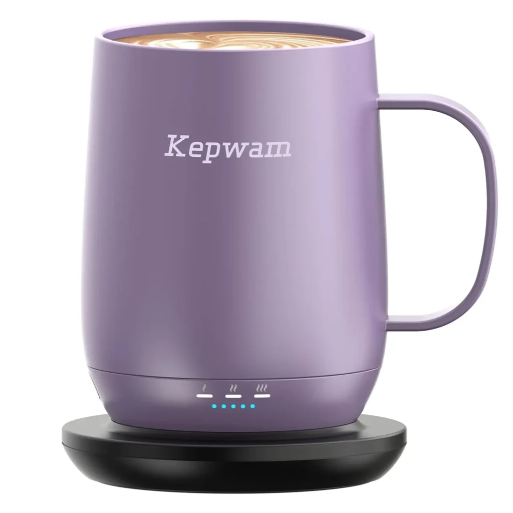 Purple self-heating mug with cute round designs on a black base, perfect for keeping drinks warm anytime