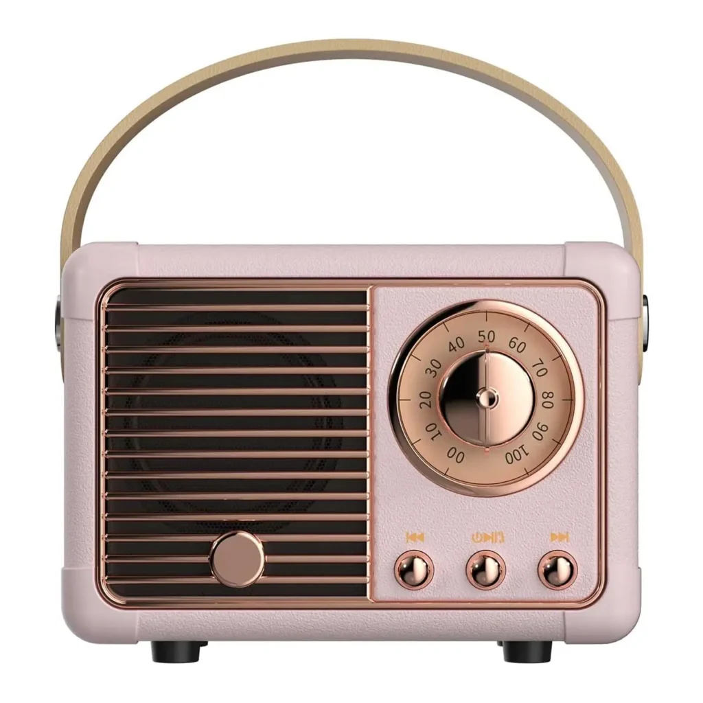 Elegant retro-style pink Bluetooth speaker with rose gold metallic accents, combining vintage charm and modern wireless functionality, perfect for stylish home décor and high-quality sound