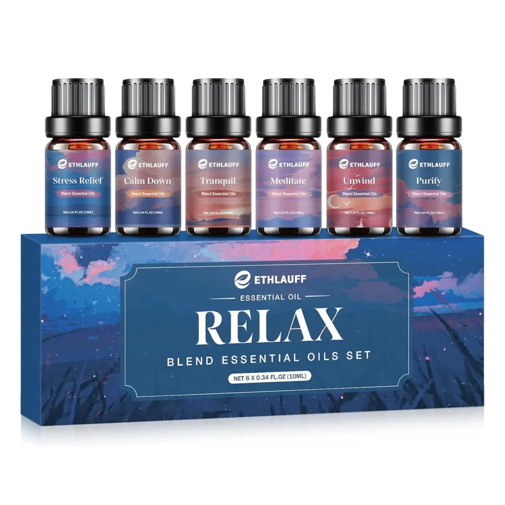 Set of six essential oil bottles on a blue night-themed box labeled Relax with elegant nighttime illustration, perfect for calming aromatherapy at home