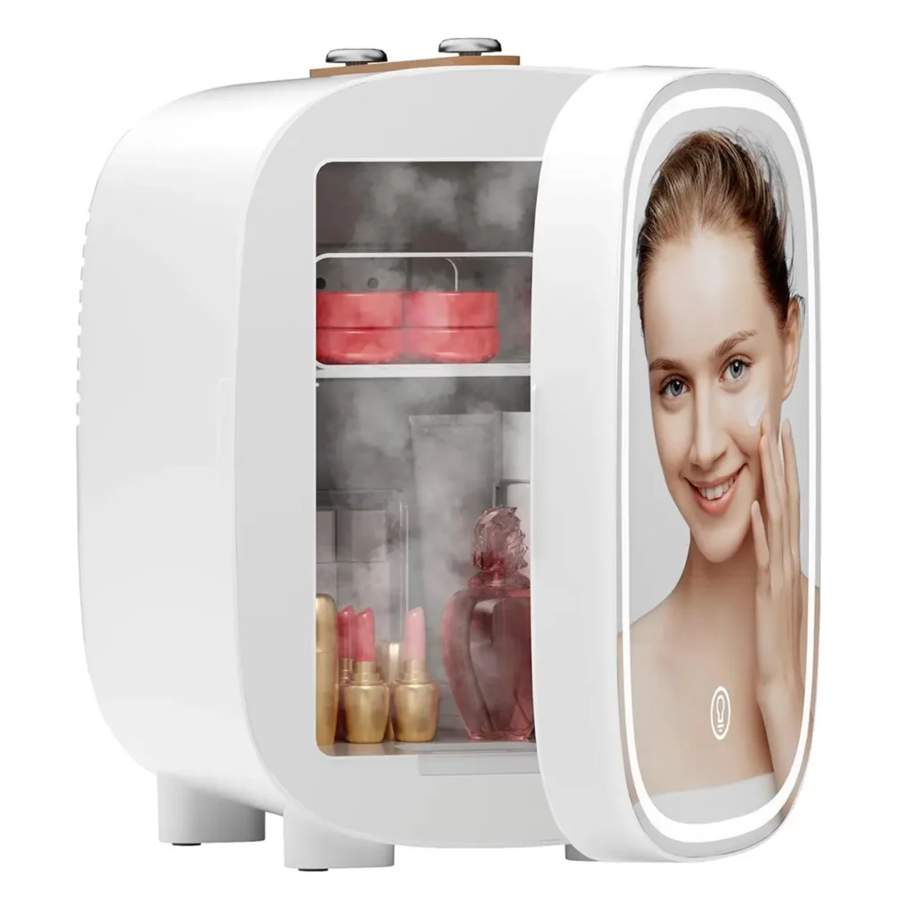 White mini beauty fridge slightly open, showing mist and filled with skincare jars, creams, and perfumes, featuring a lighted mirror with a smiling woman touching her face, perfect for keeping beauty products fresh and organized