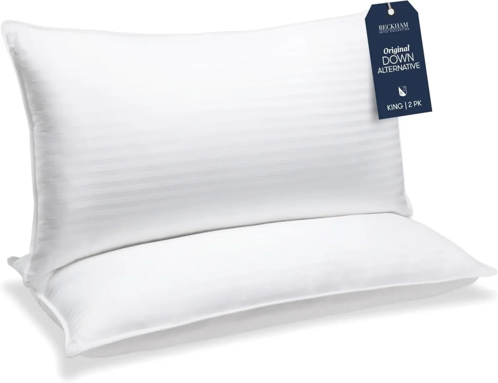 Two cooling pillows on a white background, one stacked on the other, designed for hot nights to keep the head and neck cool, soft, and comfortable for a restful sleep.